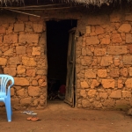 Blue chair against red wall - Angola Blue chair against red wall - Angola
