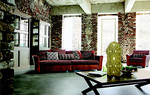 Het werk op de tafel in deze foto is een abstract gemaakt voor een reclamecampagne van het Franse interieur merk Roche-Bobois, september 2010. Foto verantwoording: Paragraphe sofa / www.roche-bobois.com